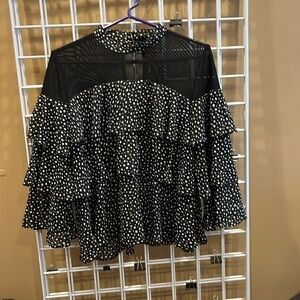 Brand new black with white small polka dotted tired ruffle top by Milano